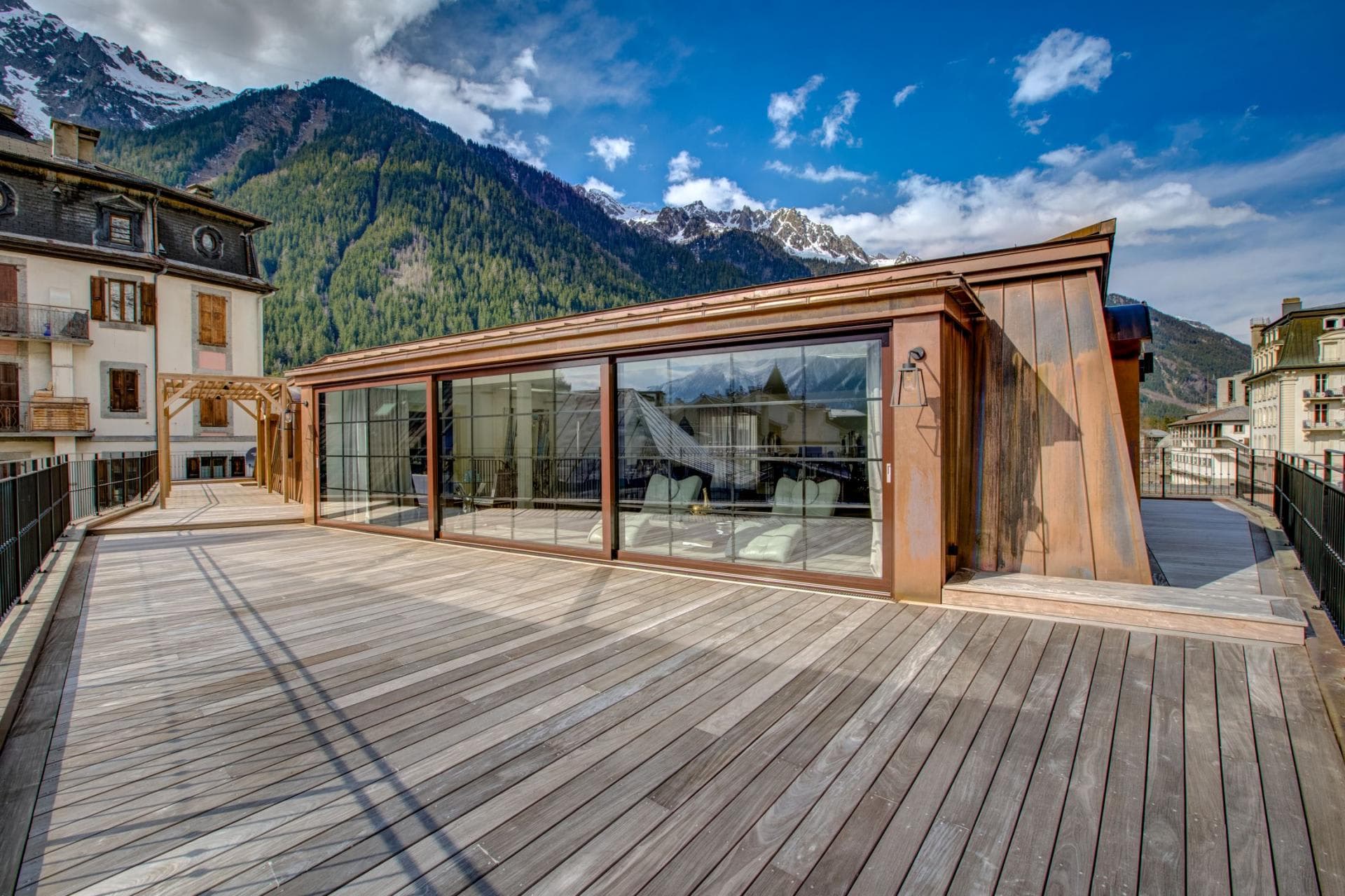 Rooftop terrace with hardwood decking and panoramic mountain views