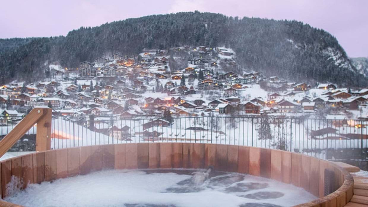 Cedar hot tub with views of Morzine village and slopes