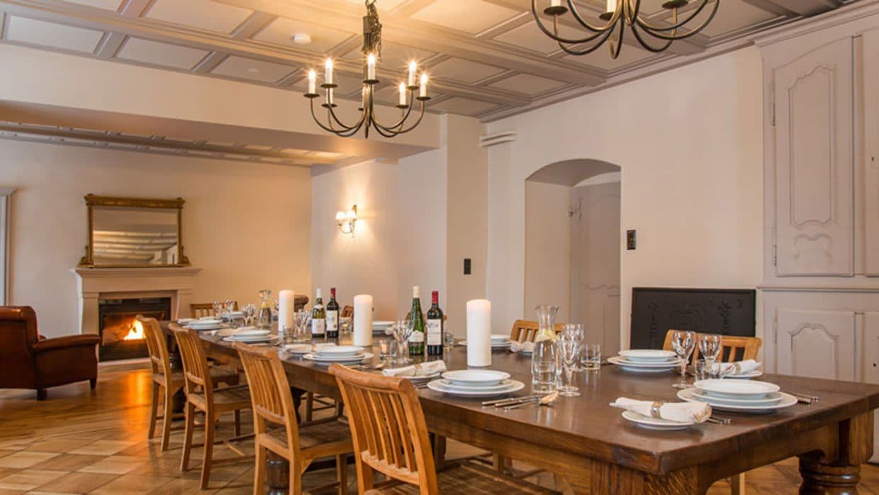 Dining room with seating for 10 and wood-burning fireplace