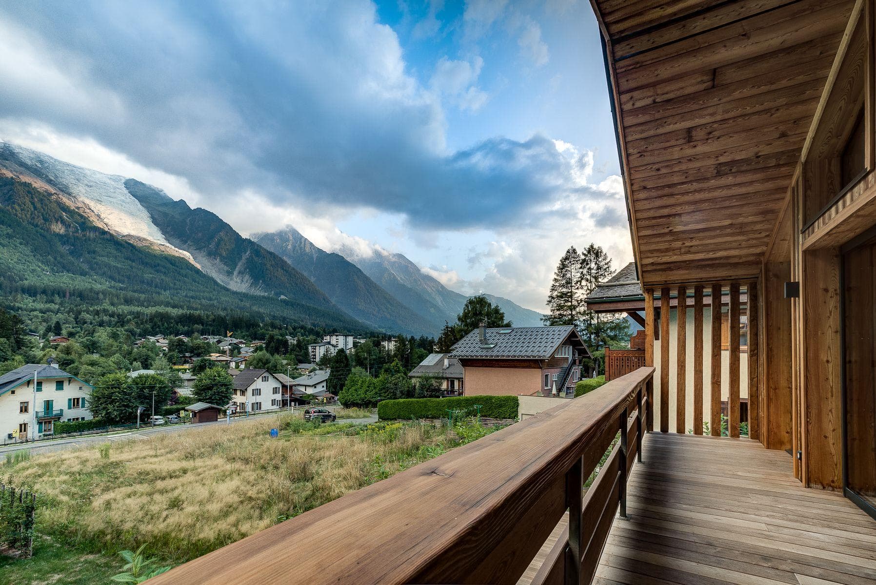 Covered balcony with mountain and glacier views