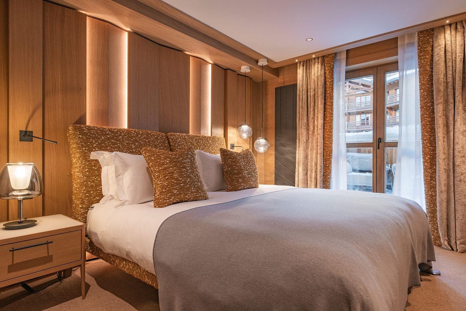 Primary bedroom with king bed and terrace access