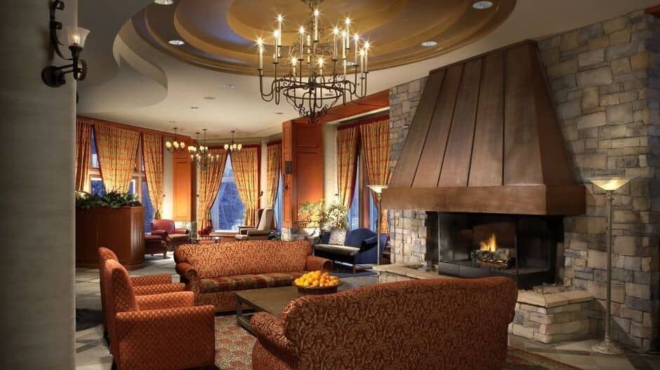 Living area with wood-burning fireplace and seating for 12