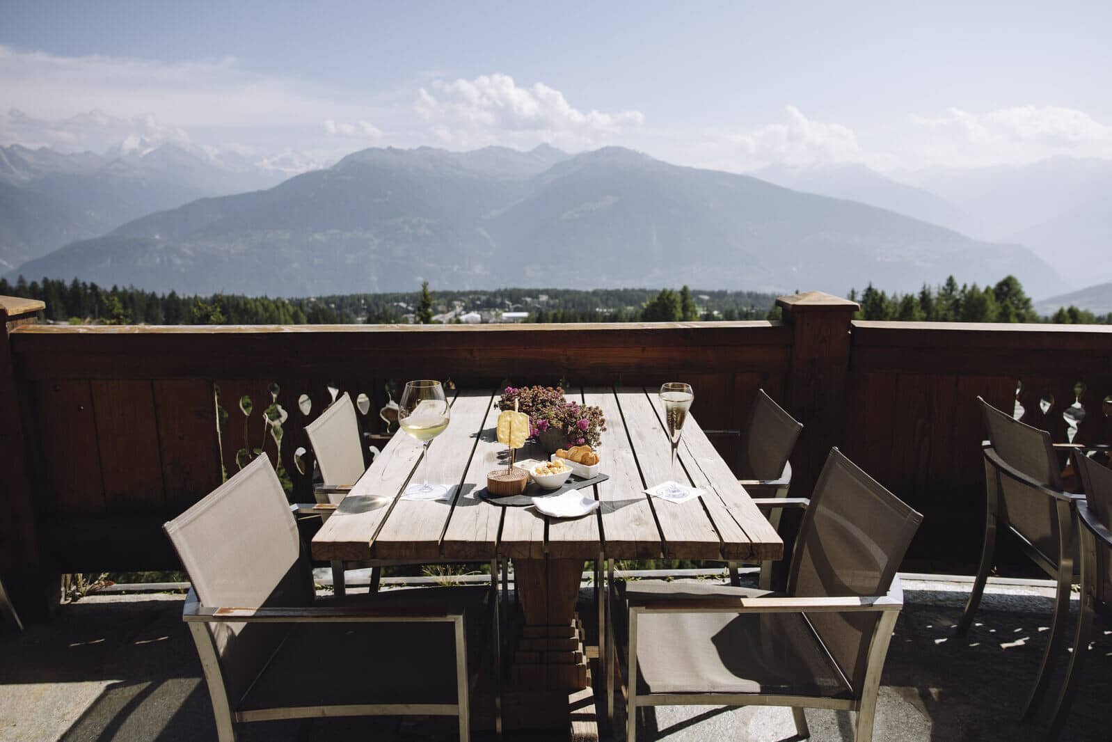 Private deck with mountain-facing dining table for 6