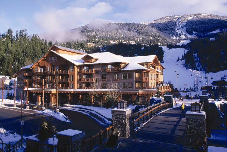 Ski-in/ski-out lodge exterior with direct access to gondola and mountain runs