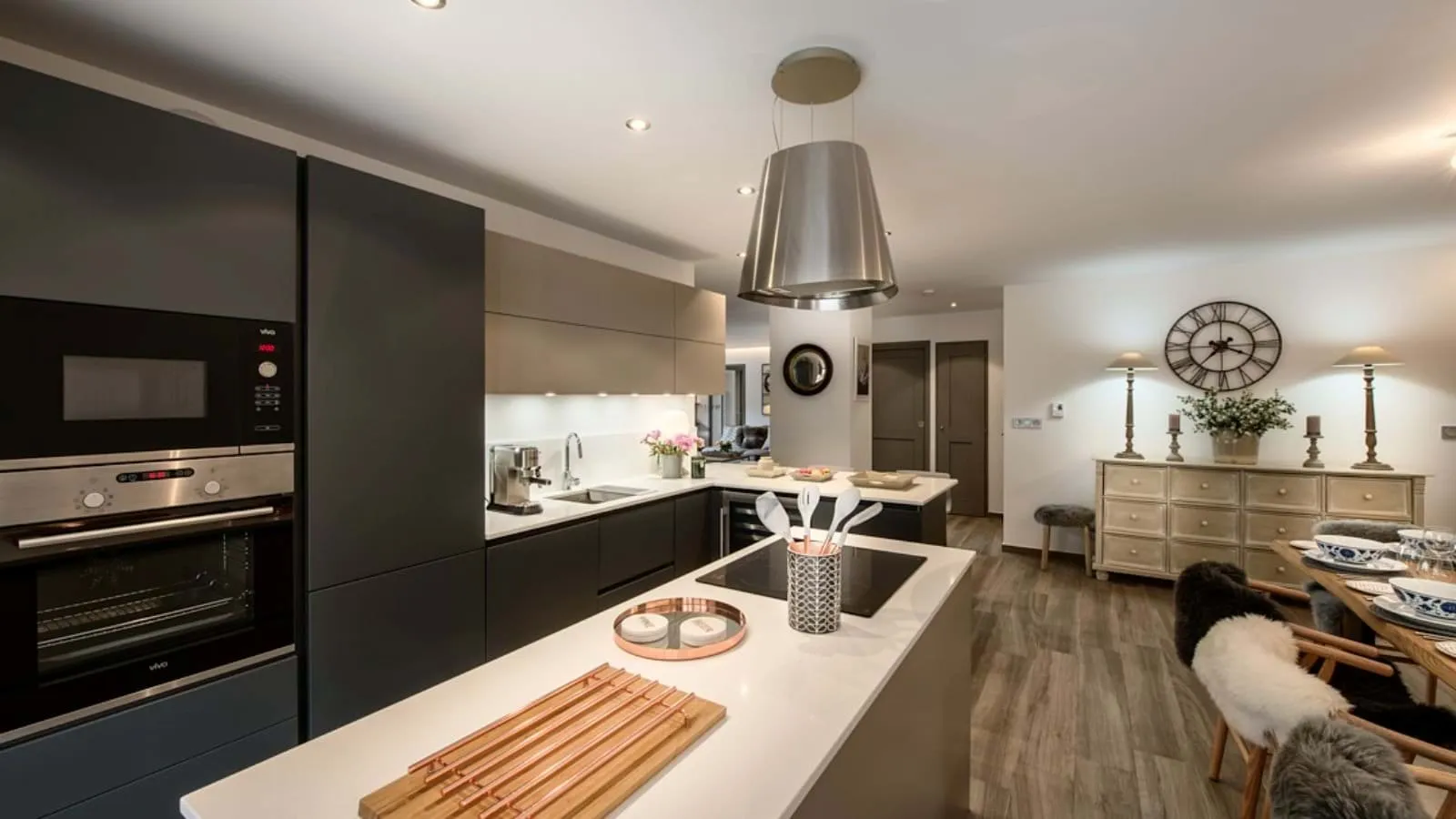 Fully equipped kitchen with island seating and wine fridge