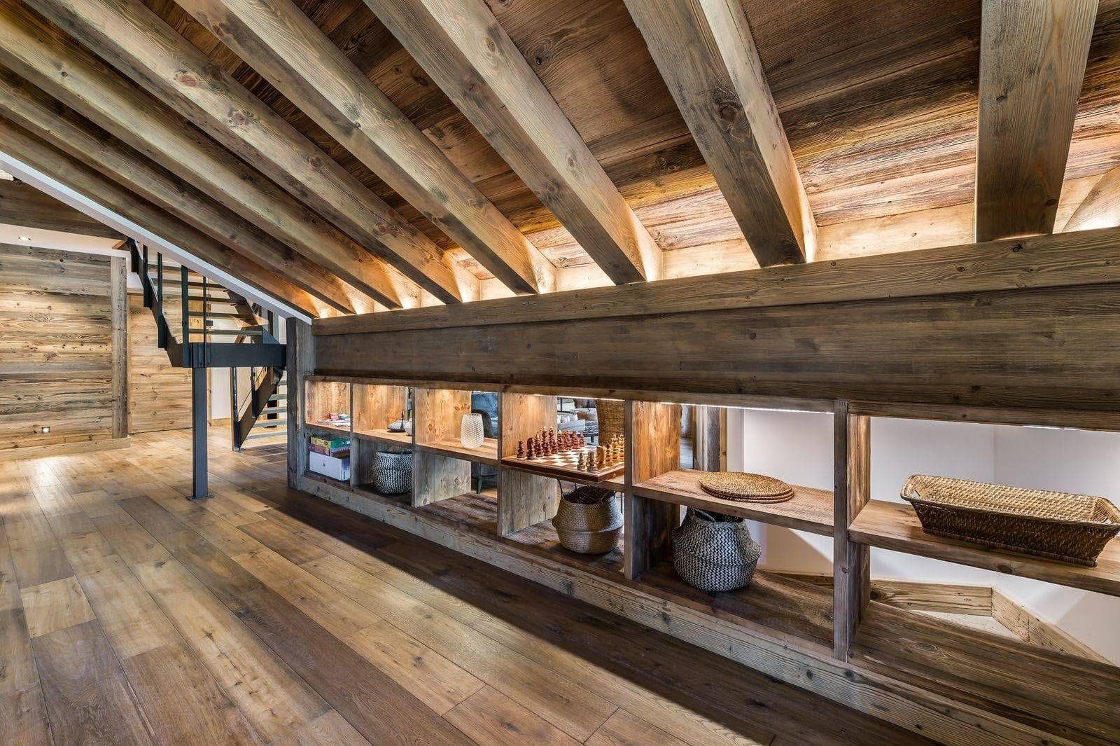 Central double-sided fireplace between living spaces