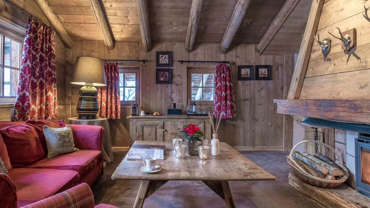 Living area with wood-burning fireplace and Nespresso coffee station