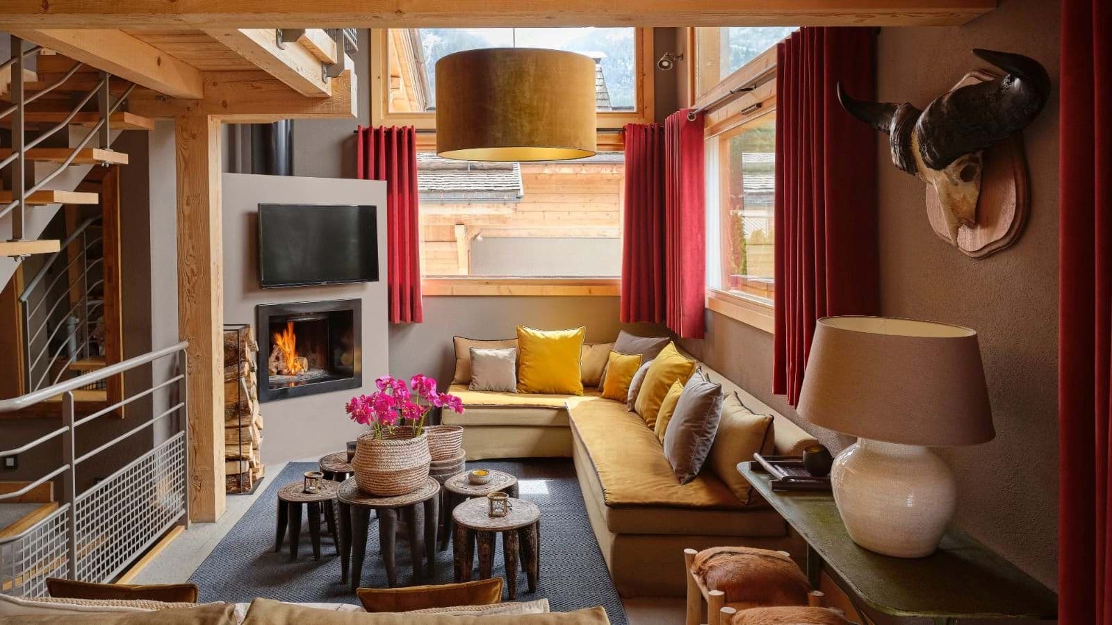 Living area with wood-burning fireplace and sectional seating for 6