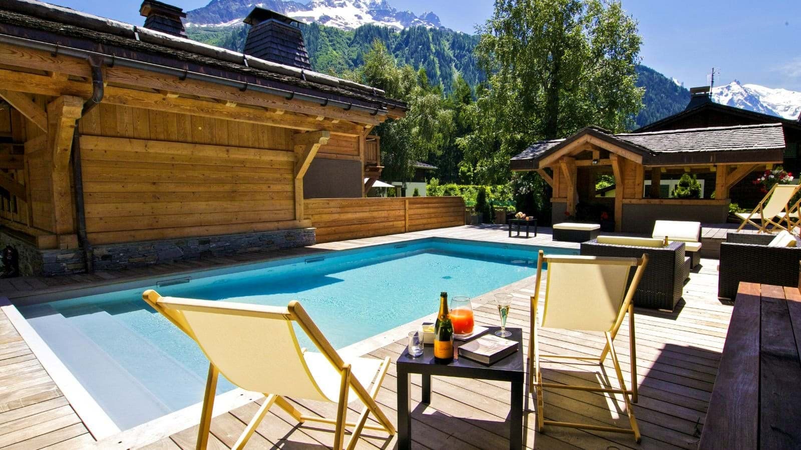 Heated outdoor pool and sundeck with Mont Blanc views