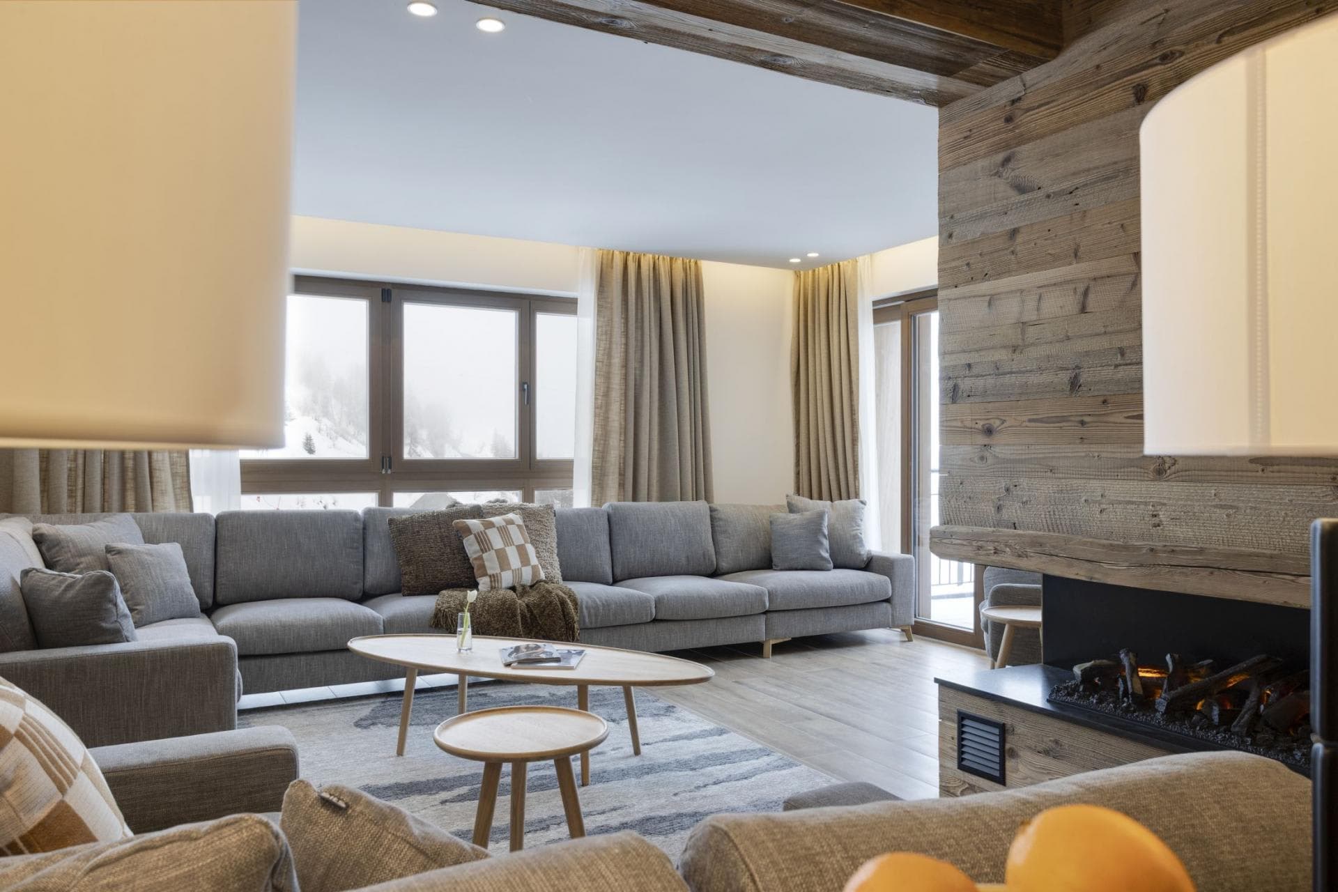 Living area with sectional seating for 8 and electric fireplace