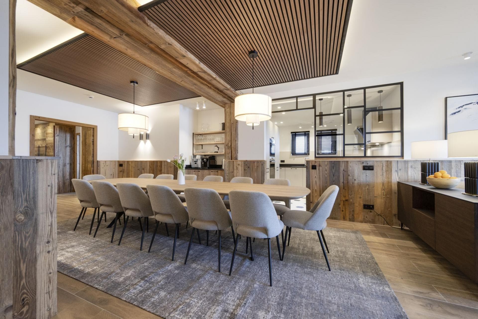 Dining area with seating for 12; coffee station and kitchen views