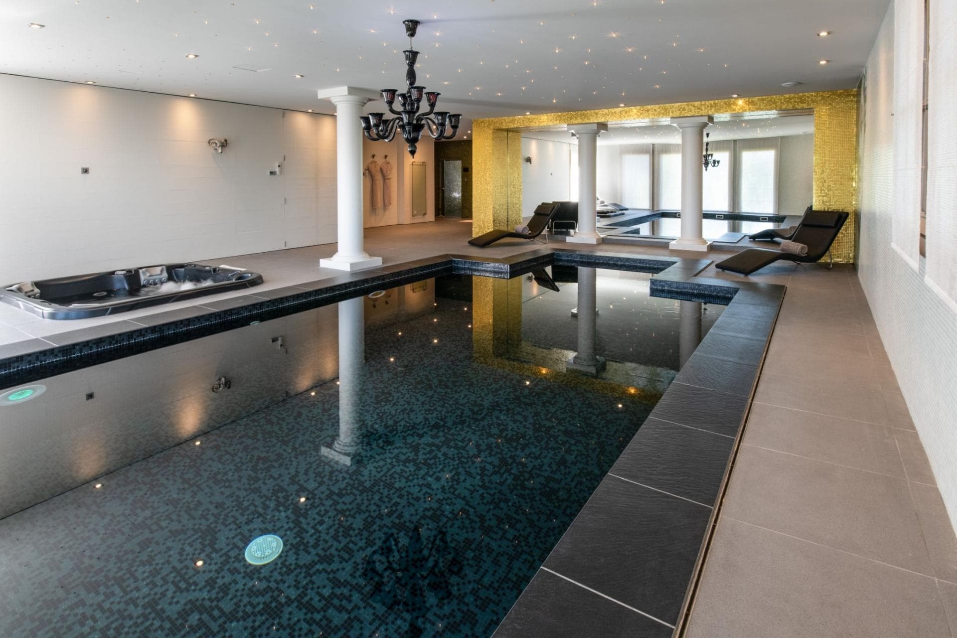 Indoor pool with hot tub and fiber-optic starlight ceiling