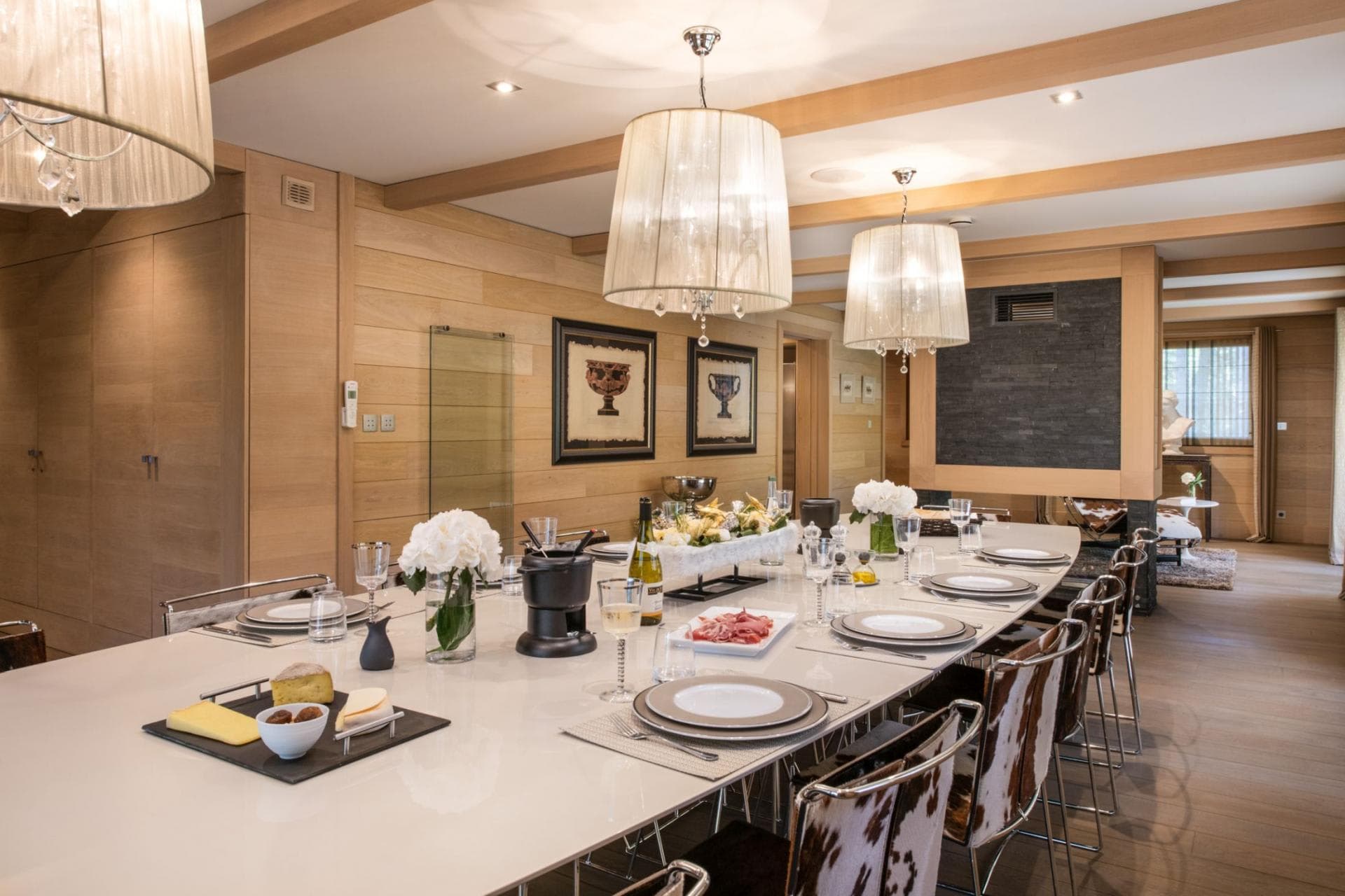 Dining area seats 12; open to living room with fireplace