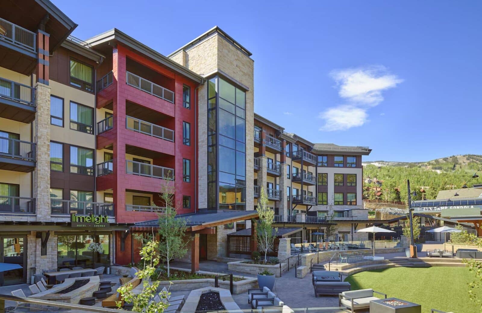 Limelight Hotel exterior with communal fire pits and gondola access