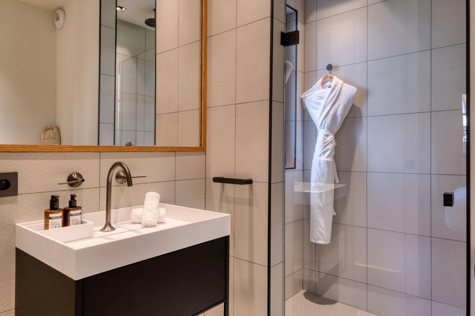 Bathroom with walk-in shower and rain shower head
