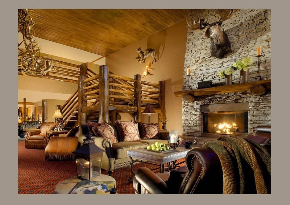 Great room with fireplace, log staircase to loft, seating for 8+