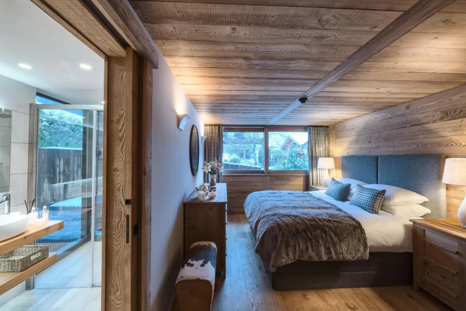 Primary bedroom with en suite bathroom and sliding pocket door