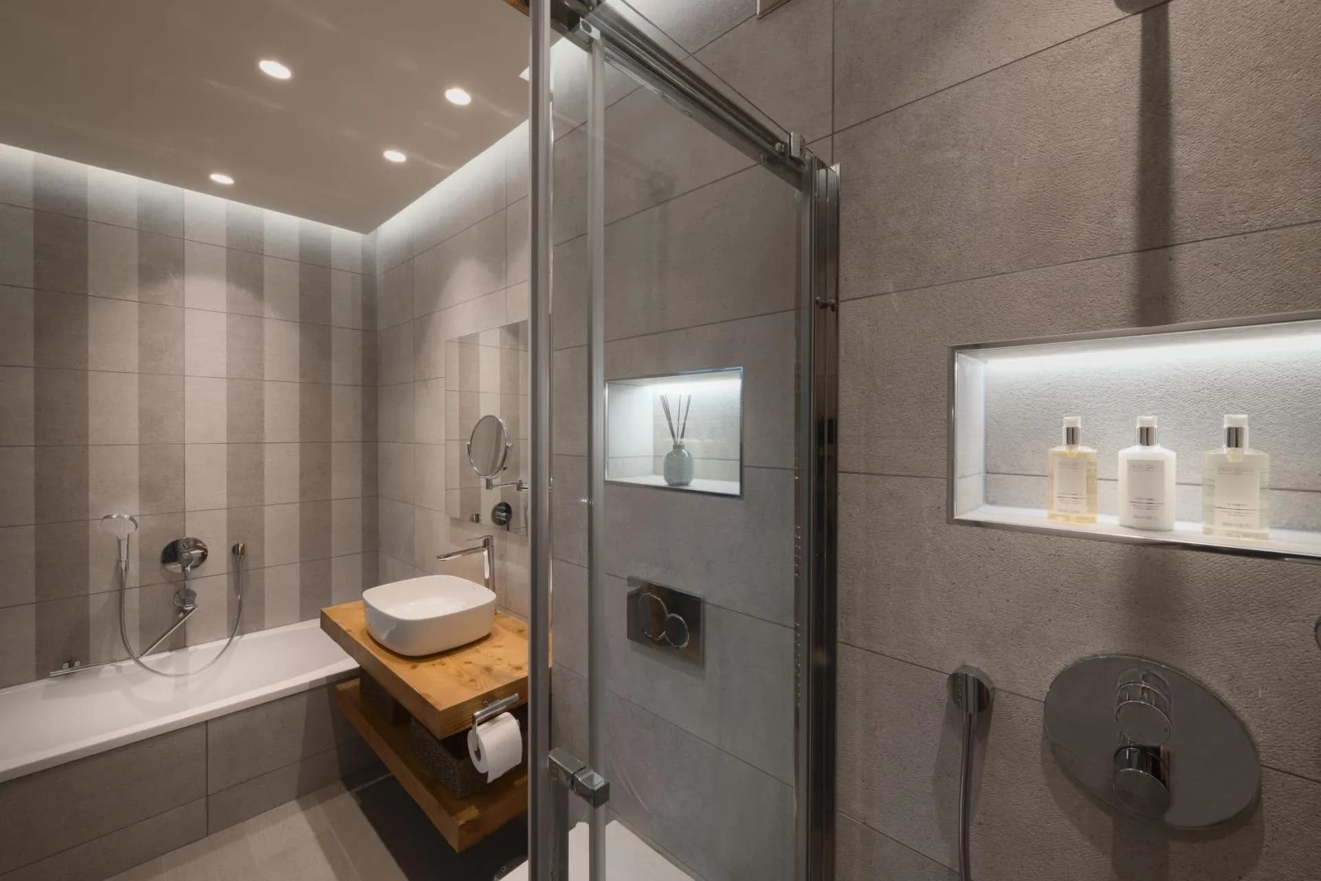 Bathroom with walk-in shower, soaking tub, and vessel sink vanity