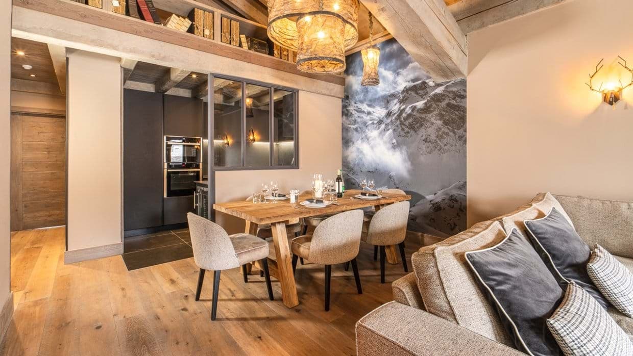 Open-plan dining area with seating for 6; adjacent to kitchen