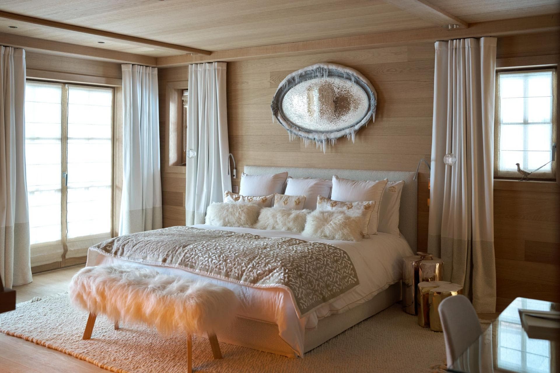 Primary bedroom with king bed and light-filtering privacy shades