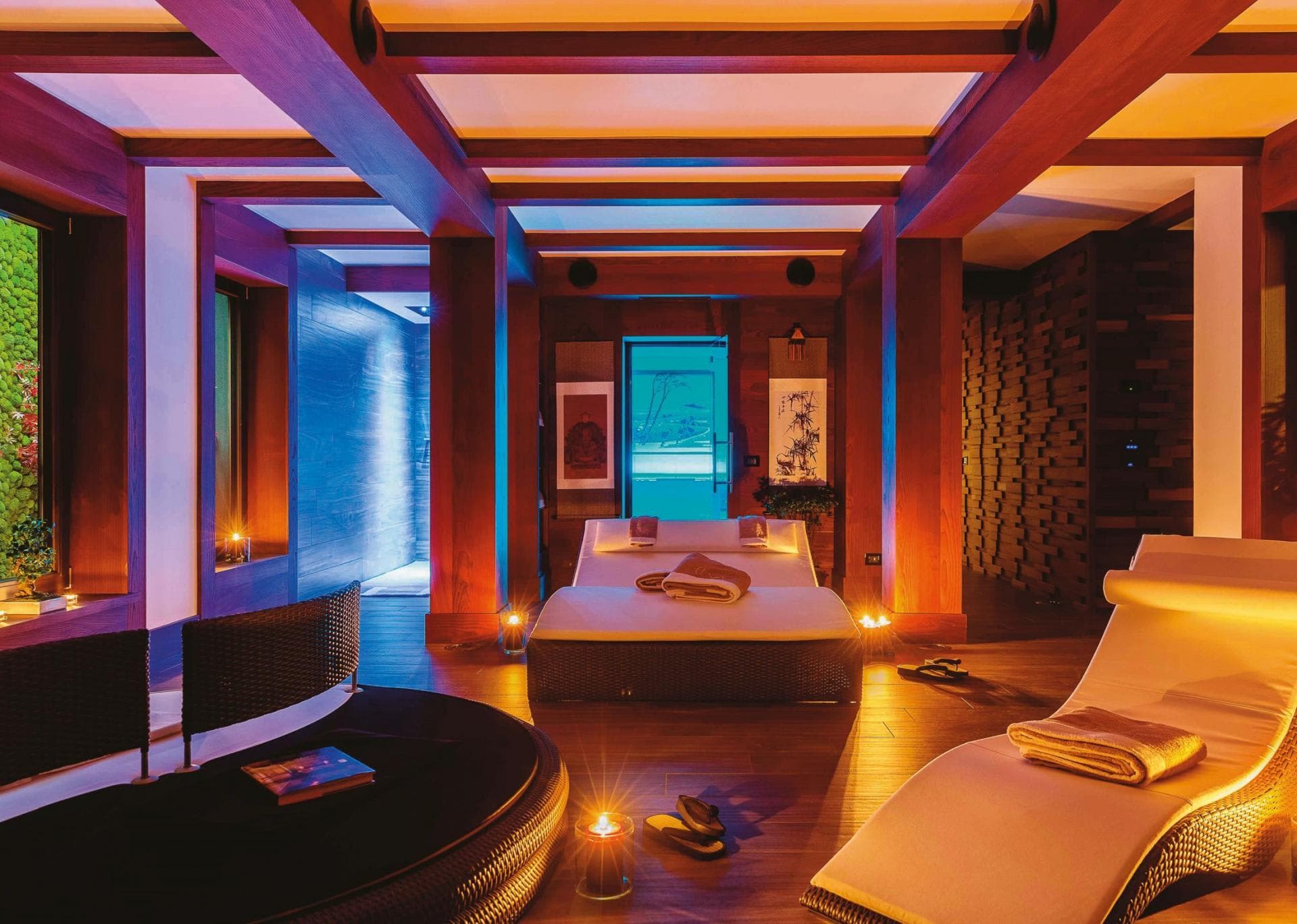 Private spa lounge with heated daybeds and integrated surround sound