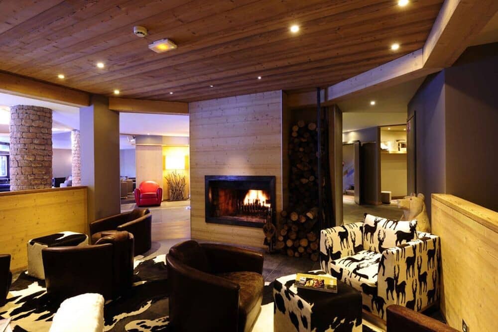 Lounge area with wood-burning fireplace and provided firewood