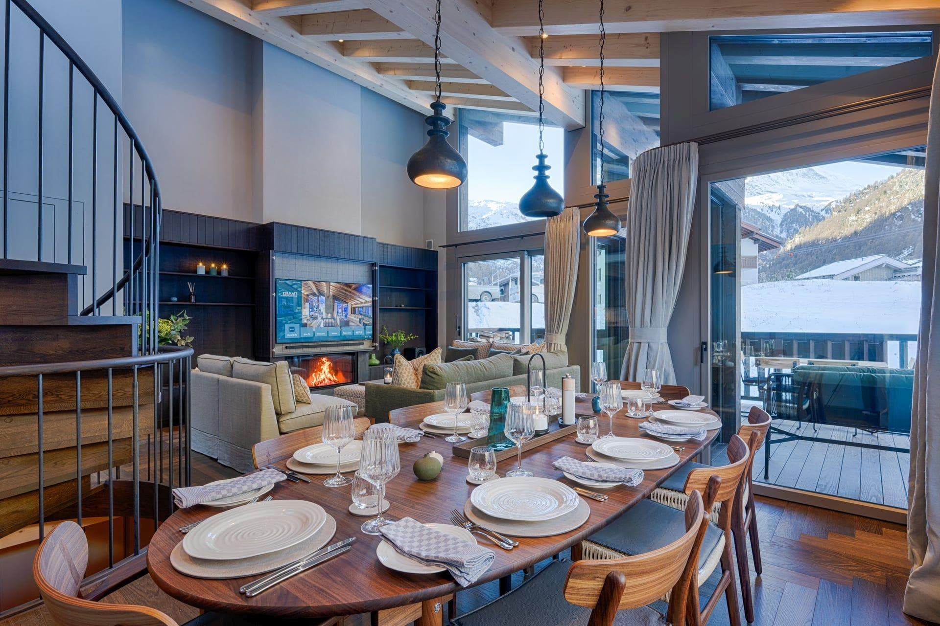 Open-plan dining area seats 8; adjacent to living room with gas fireplace