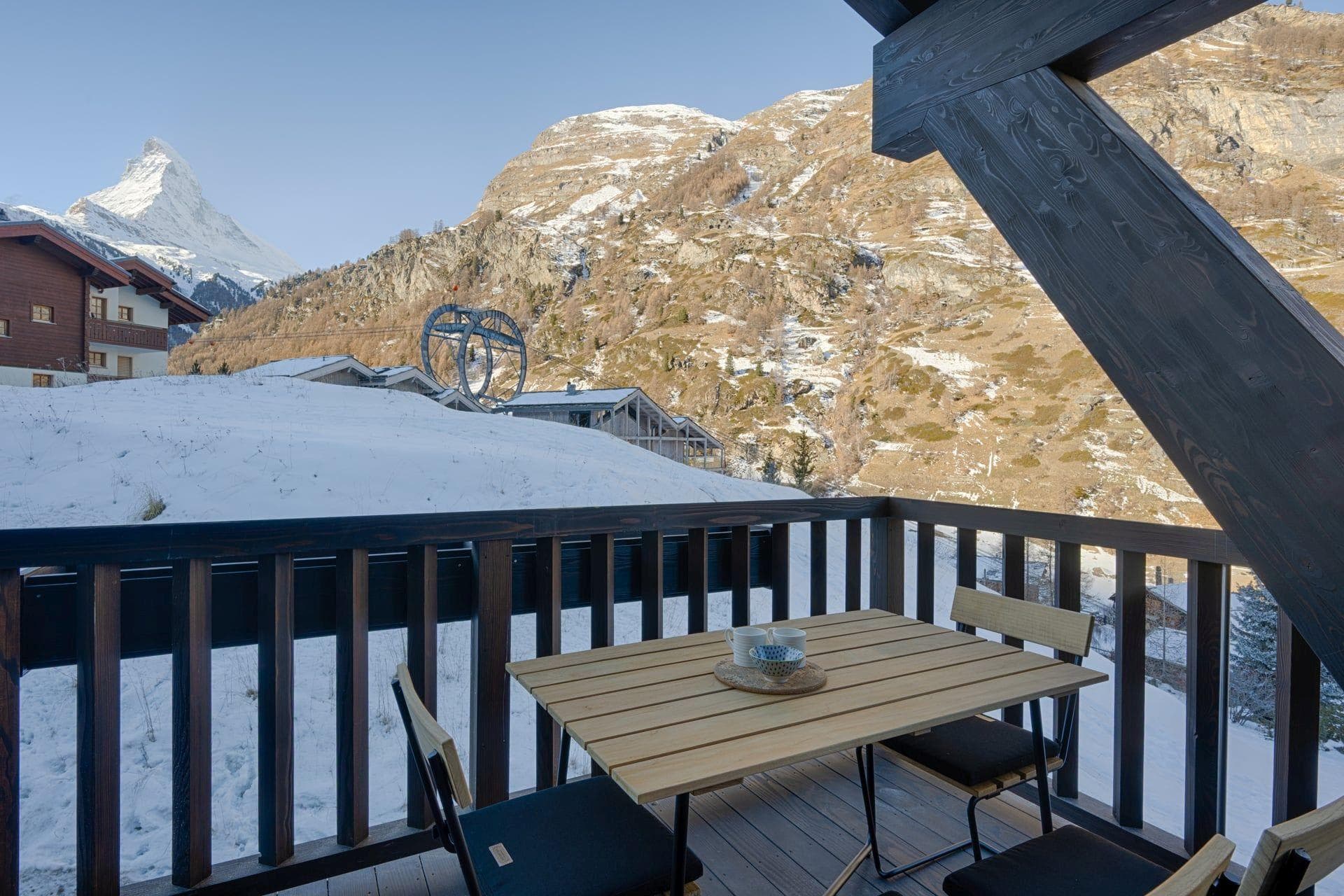 Private balcony with Matterhorn views and outdoor dining for 4