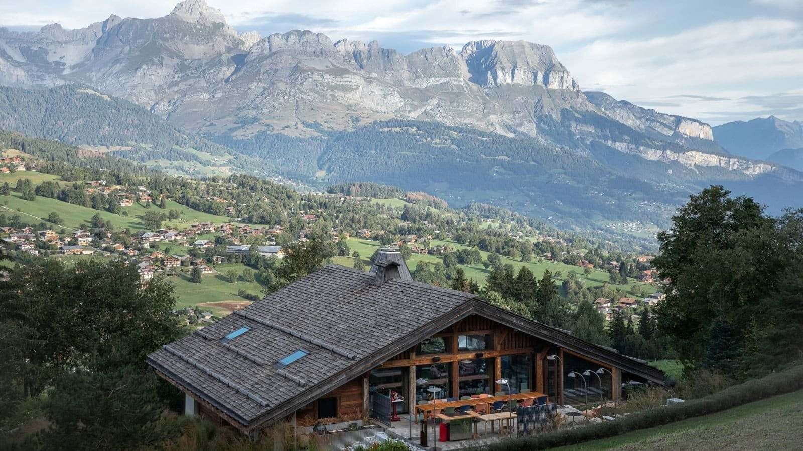 Chalet terrace with dining for 12 and mountain range views