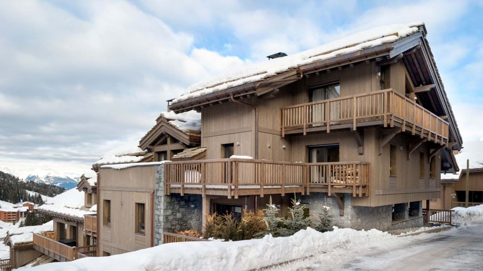 Ski-in, ski-out timber chalet with private balconies and mountain views