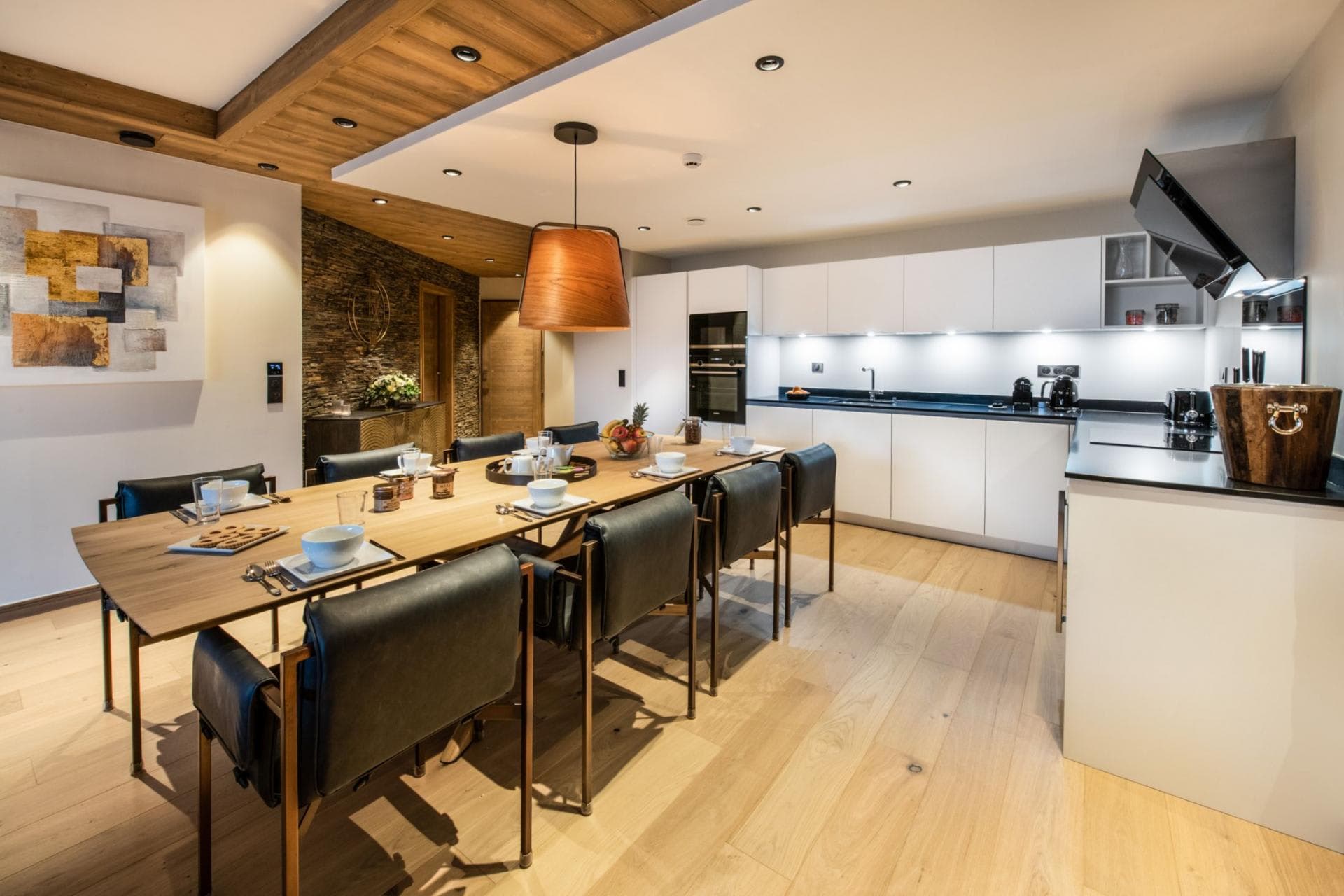 Open-concept kitchen and dining area with seating for 8