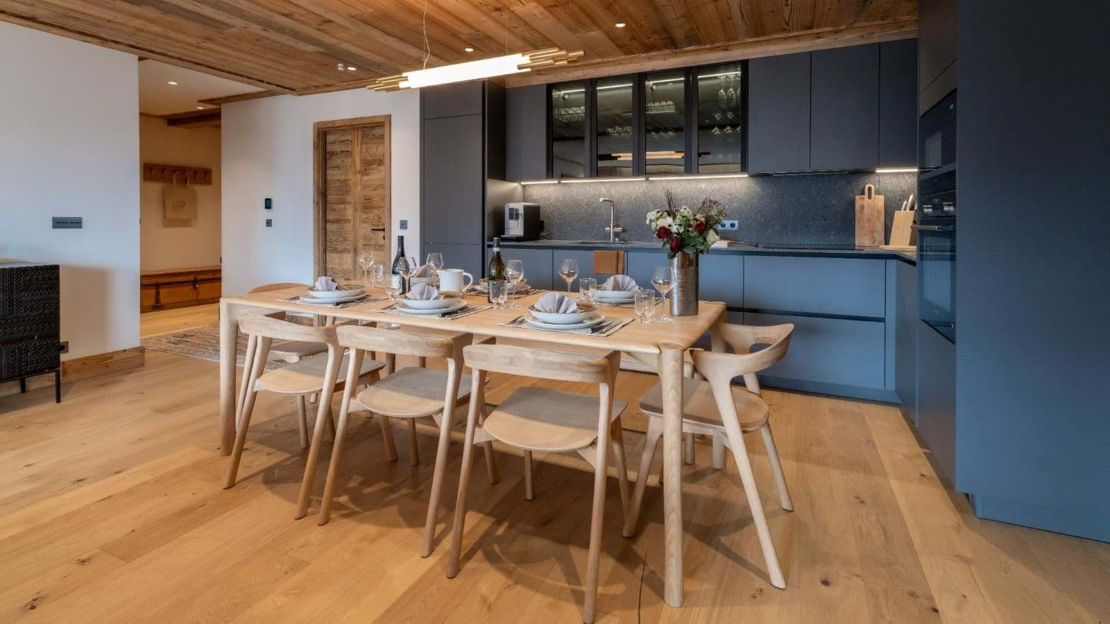 Dining area for 6 adjacent to kitchen with built-in espresso machine