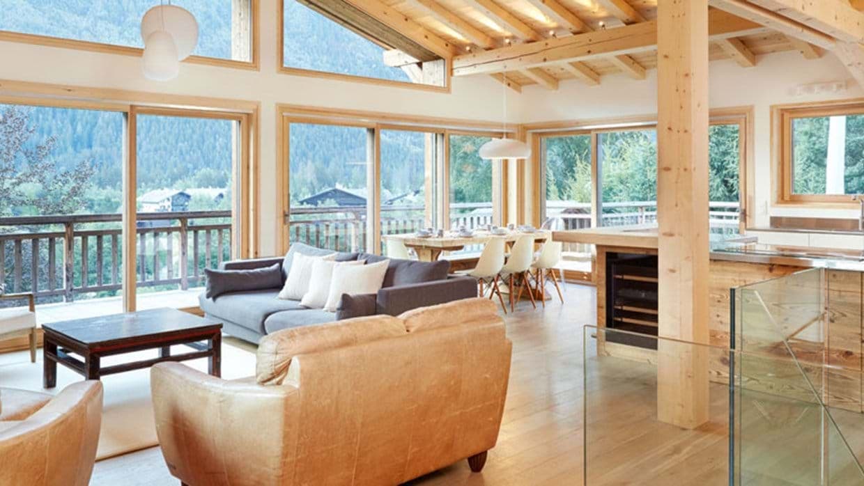 Open-plan living area with vaulted ceilings and integrated wine cooler