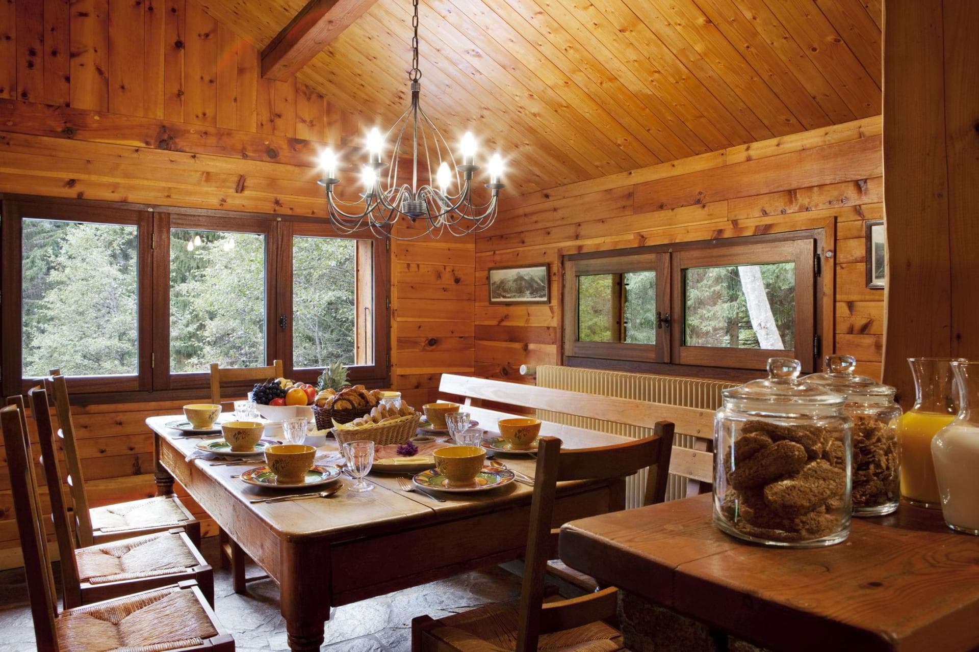Dining area with bench seating and wood-paneled walls