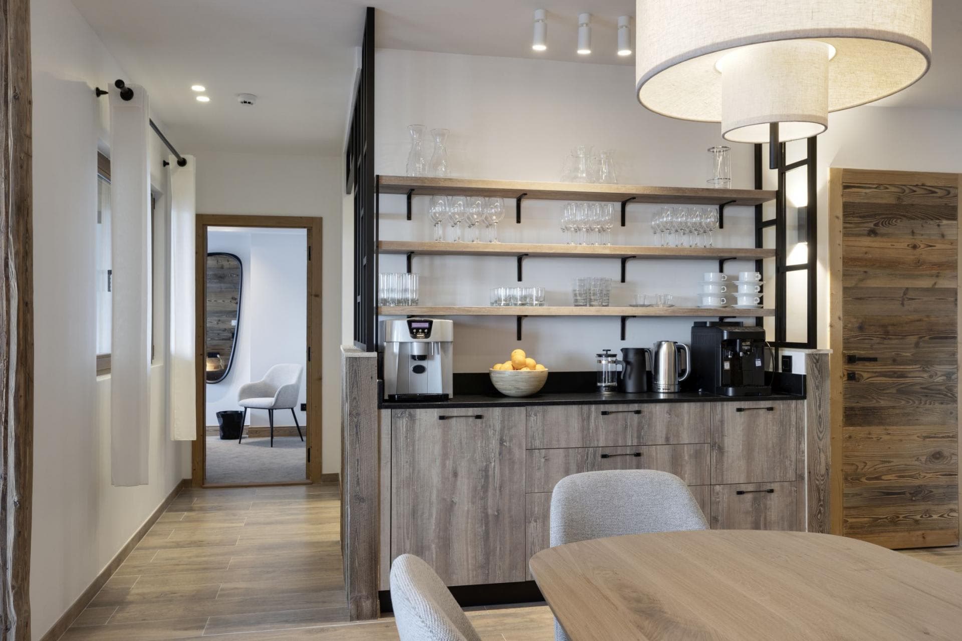 Coffee station with bean-to-cup machine, kettle, and glassware shelving