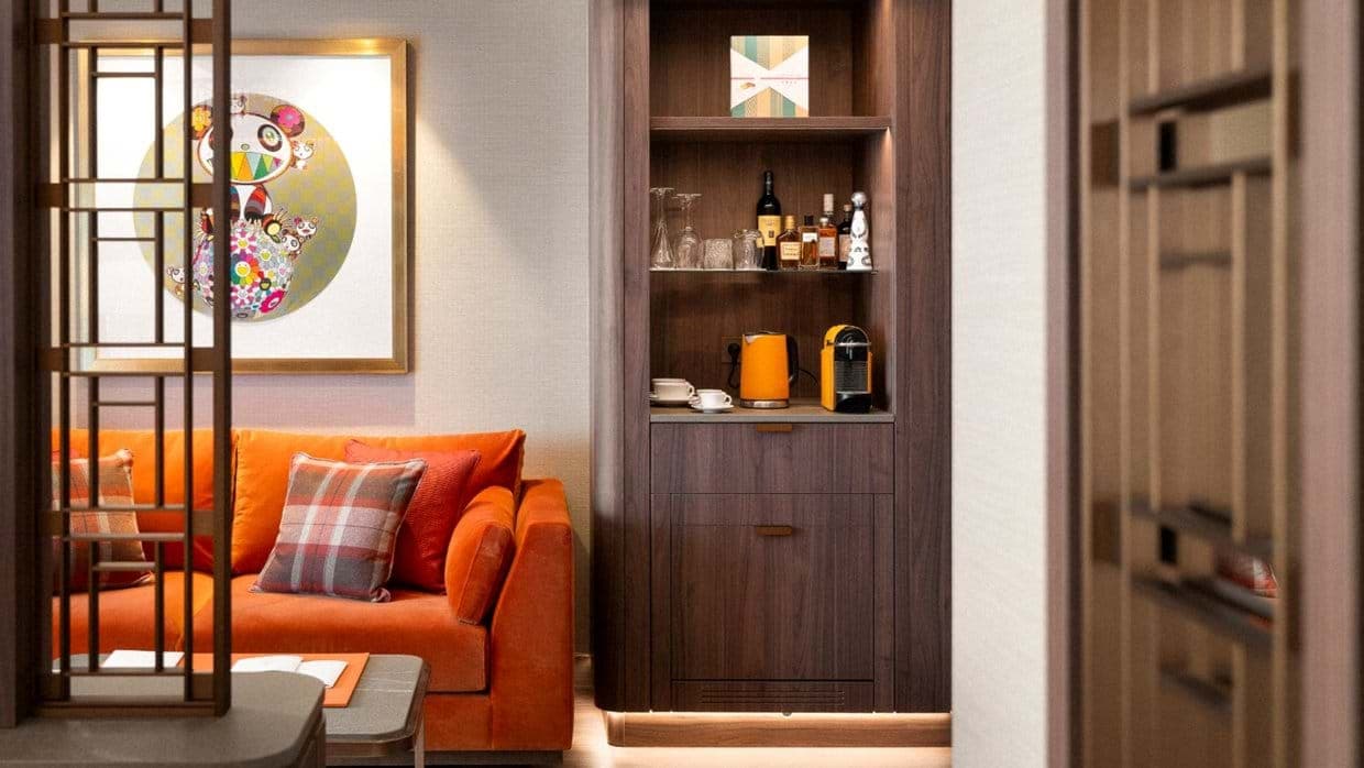 Living area with built-in bar, Nespresso machine, and kettle