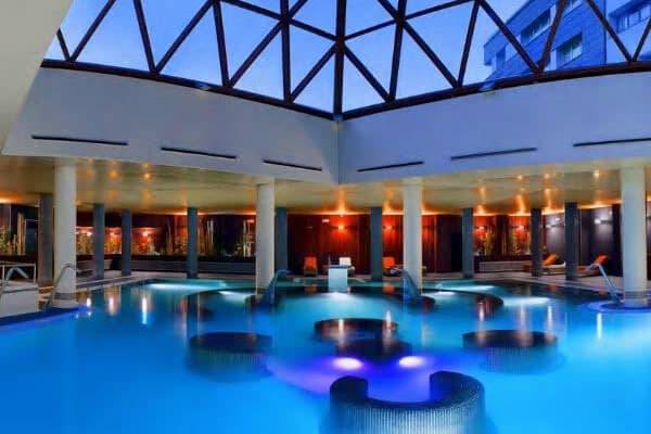 Indoor pool with glass skylight and hydrotherapy water jets