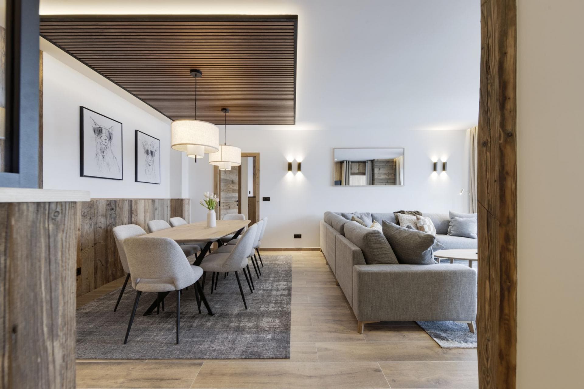 Open-plan living area with dining for 8 and large sectional sofa