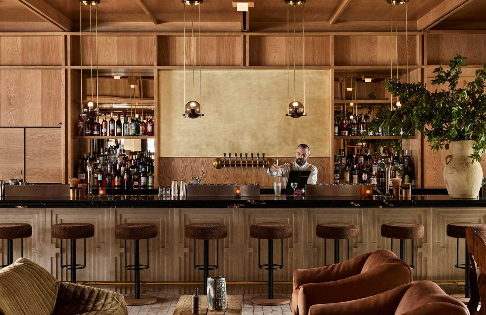 Full-service bar with 10 draught taps and lounge seating