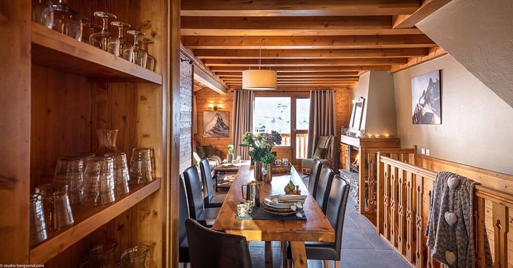 Dining area with seating for eight and wood-burning fireplace