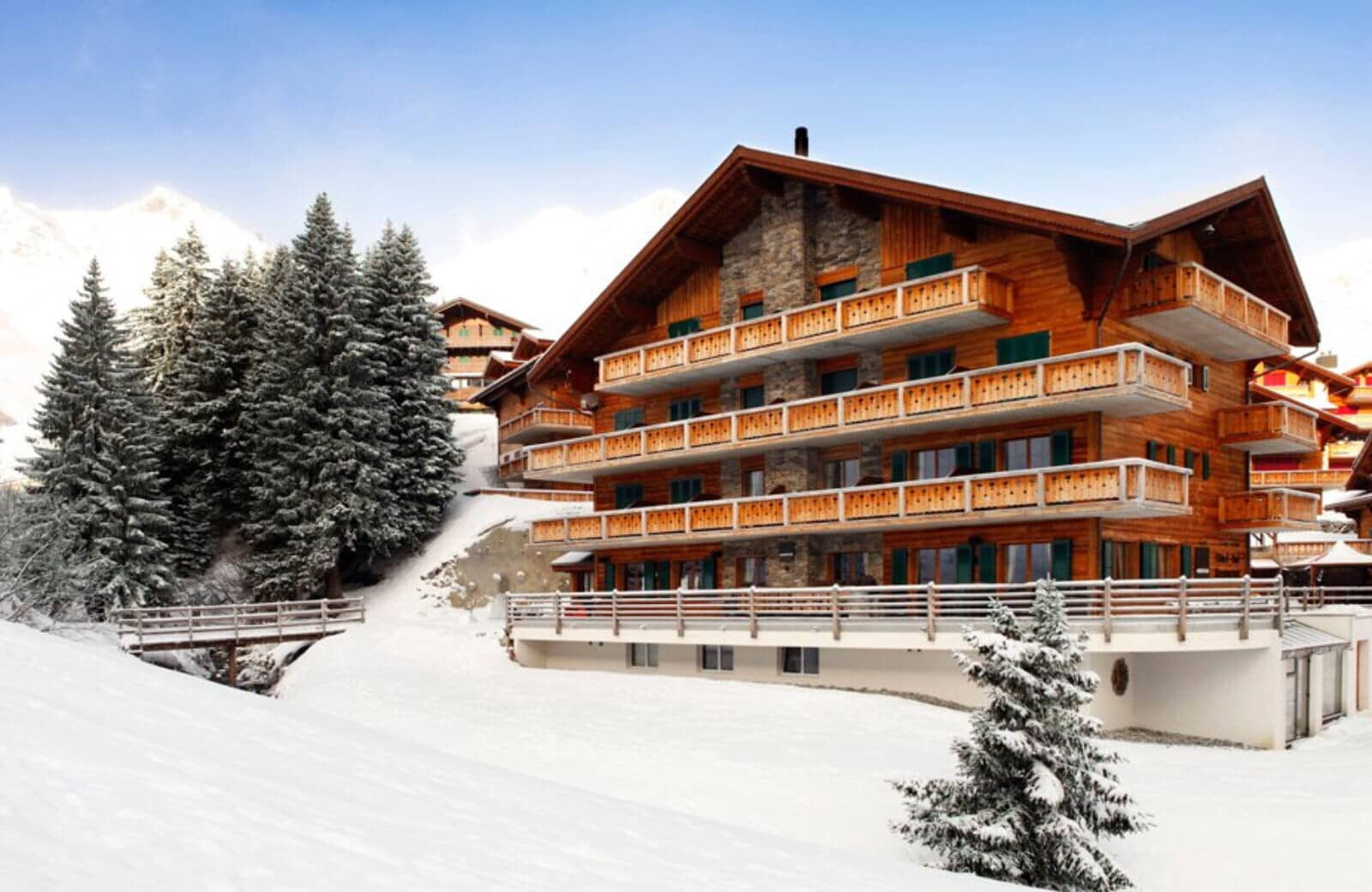 Ski-in/ski-out chalet with wrap-around balconies and mountain views