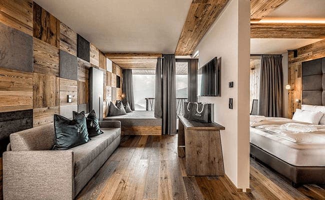 Family suite with sofa bed, daybed, and semi-private king bedroom