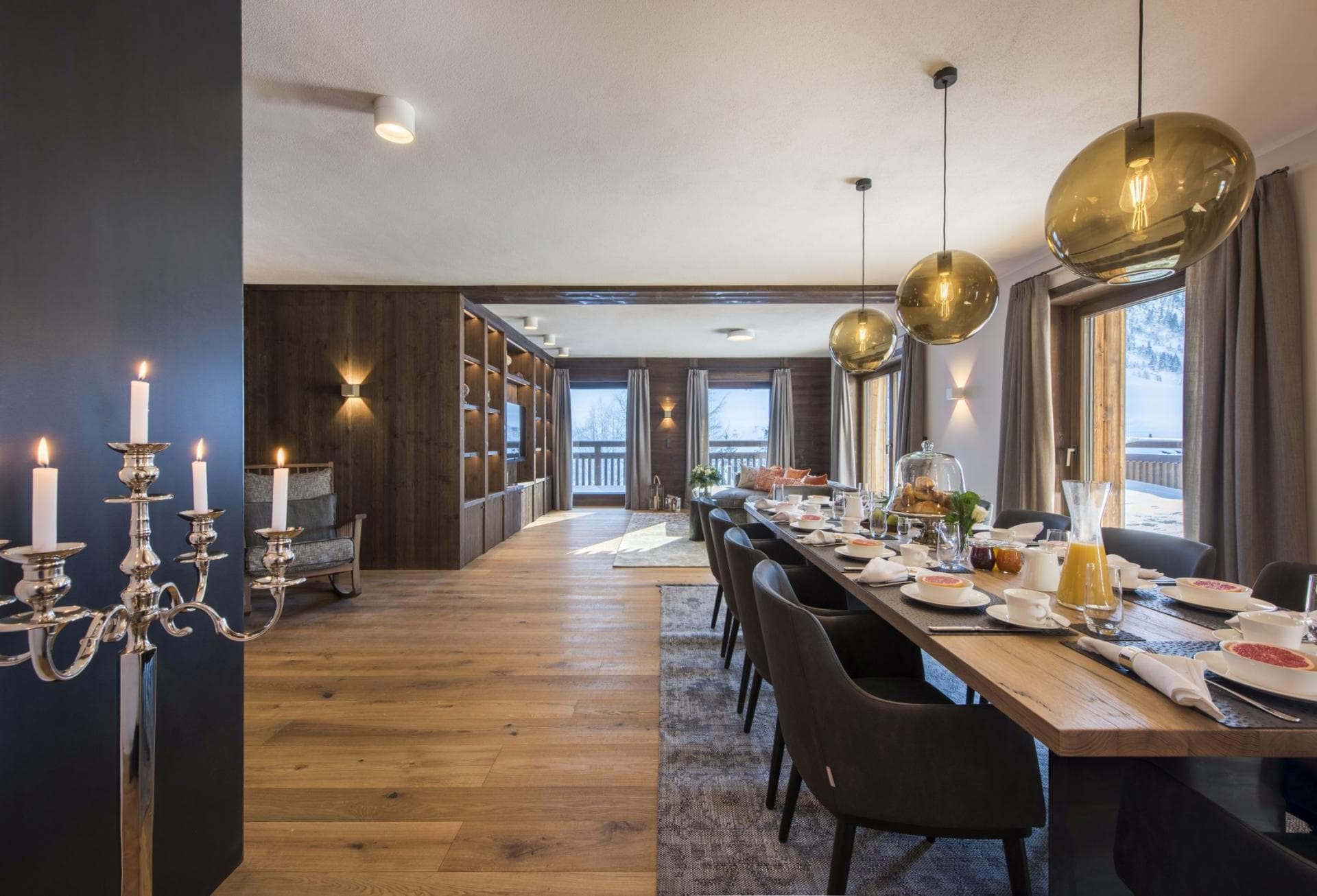 Open-plan dining area with seating for 12 and balcony access