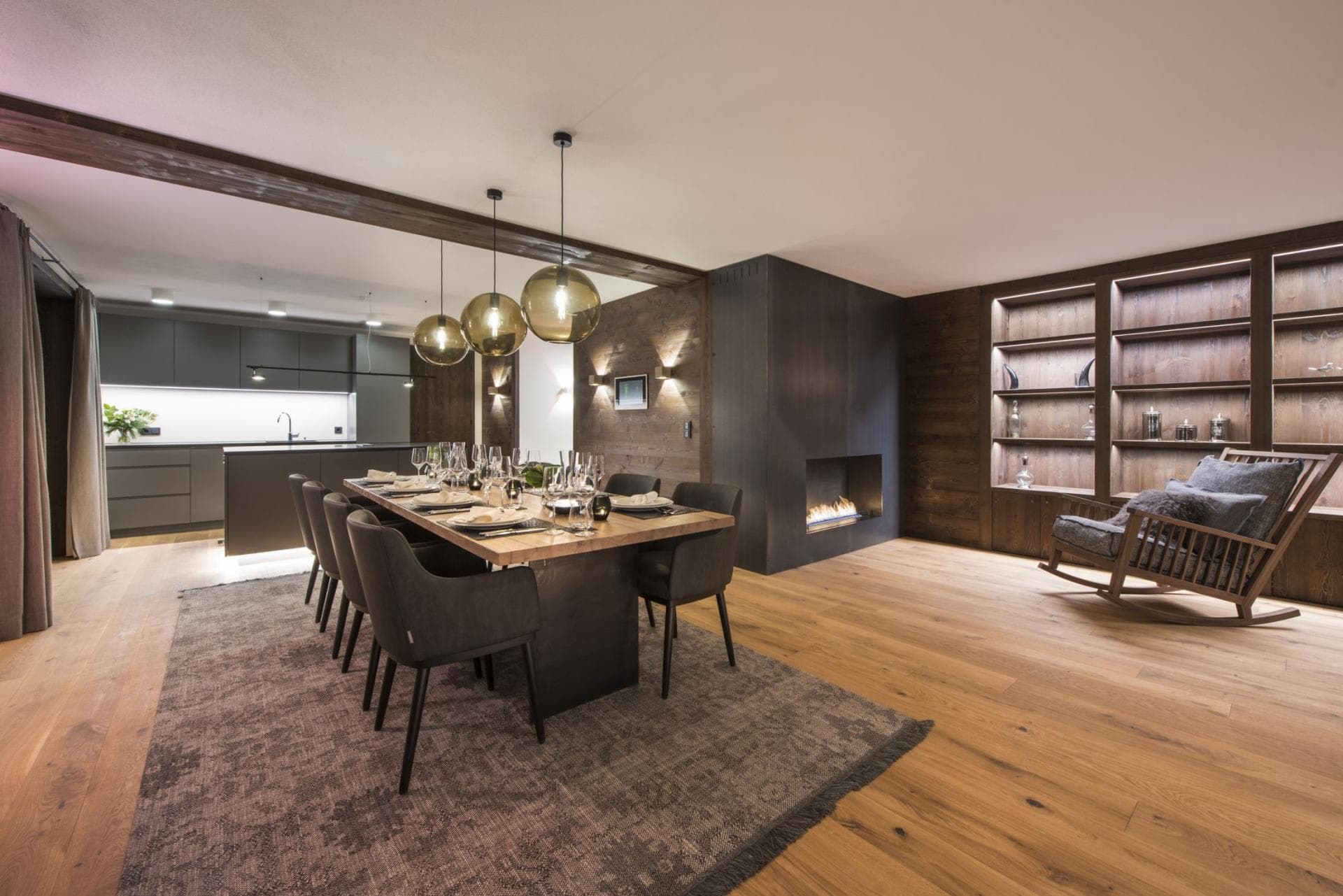 Dining area seats 10; gas fireplace and wood-paneled reading nook