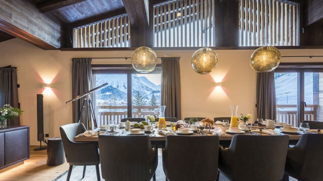 Dining area seats 10; mountain views and balcony access