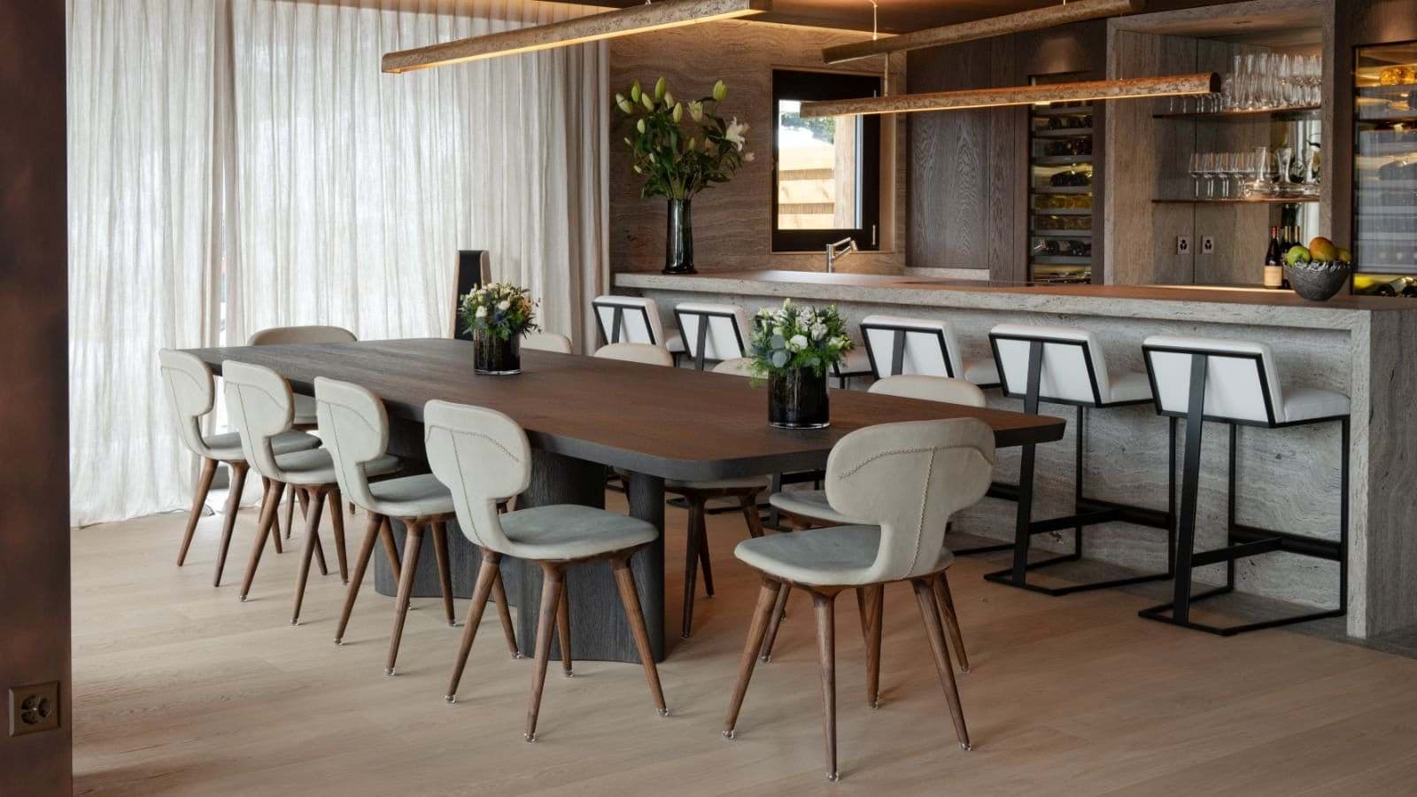 Dining area for 10 with wet bar and wine refrigeration