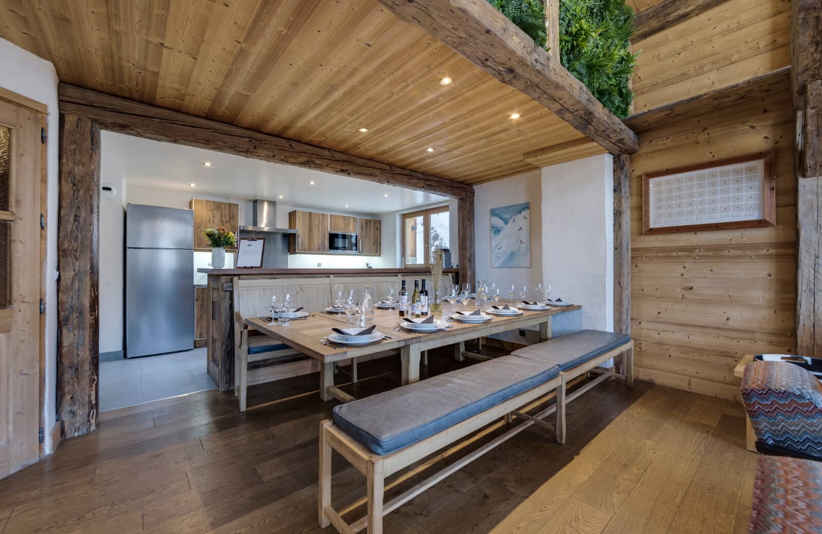 Dining area with seating for 12; kitchen with full-size fridge