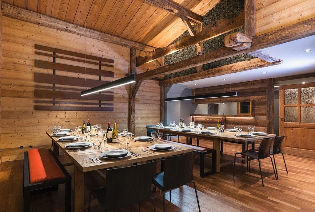 Dining area with dual harvest tables; seating for 18 guests