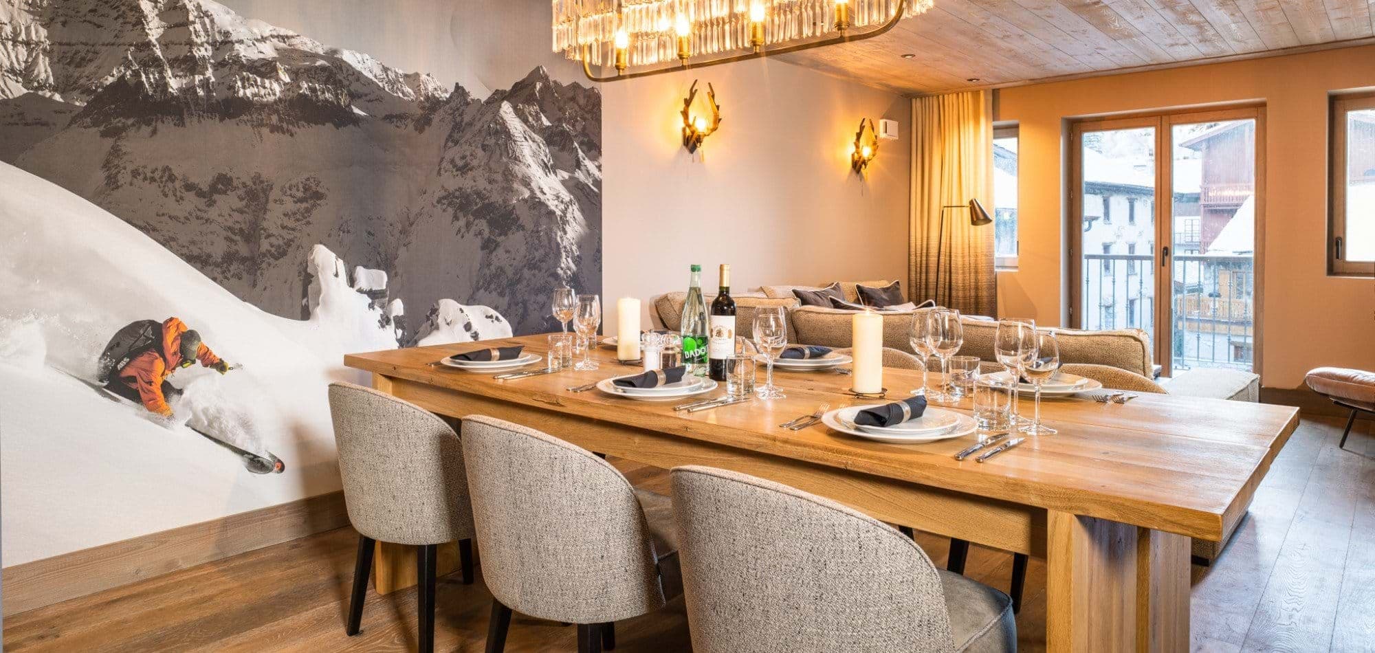 Dining area seats 8; balcony access with village views