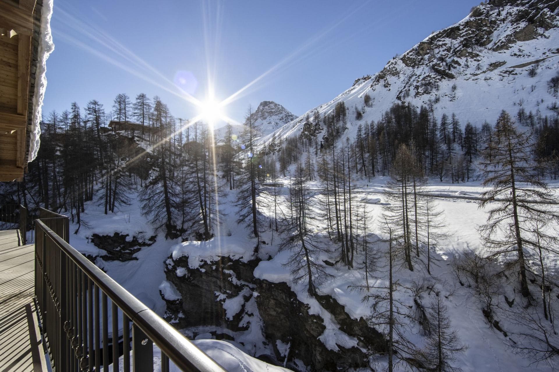 Private balcony with southwest-facing alpine valley and mountain views